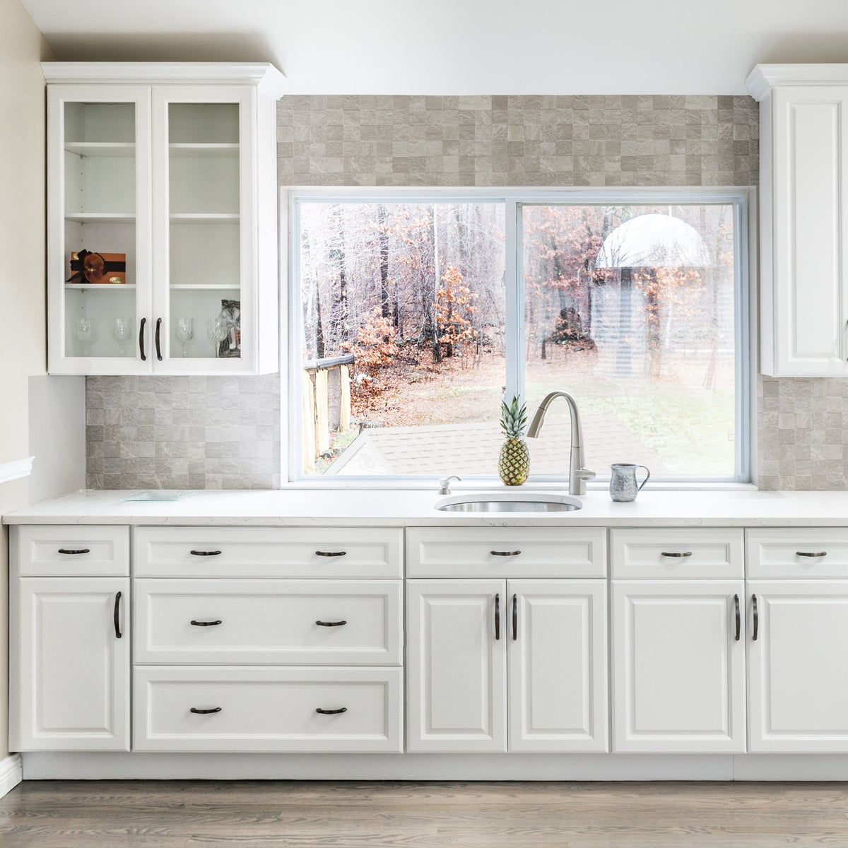 Fabuwood Hallmark raised panel kitchen cabinets in Frost white, shipped assembled