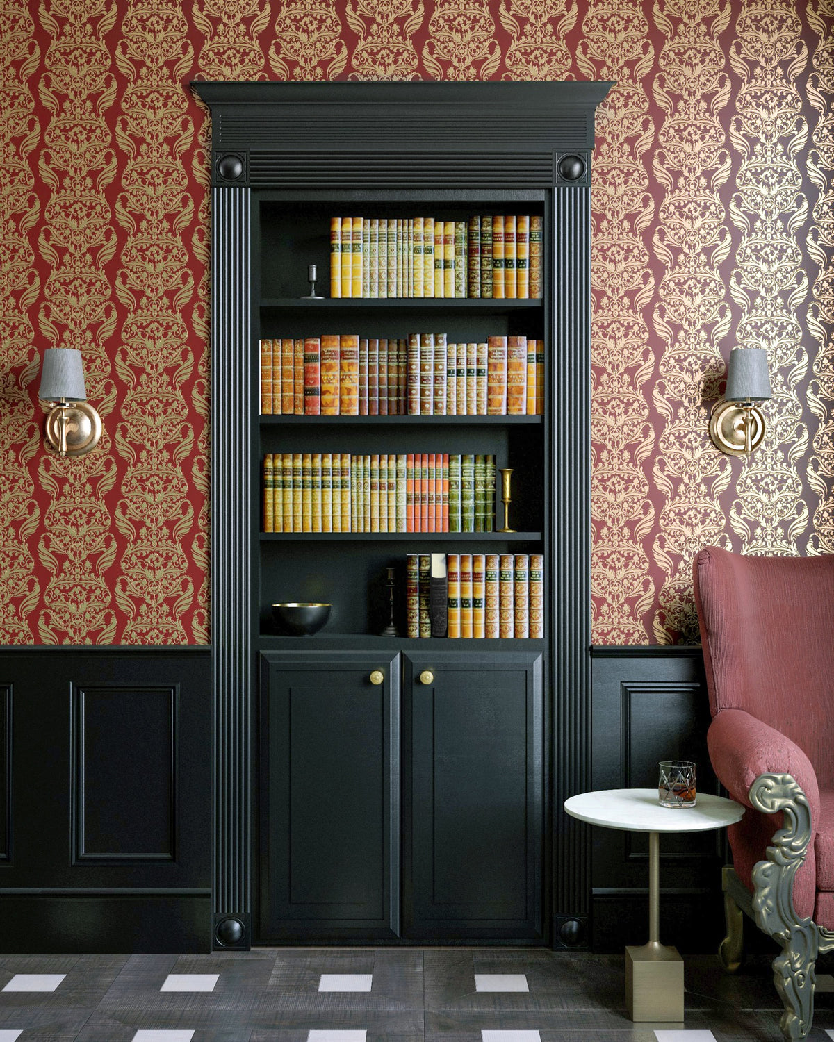 Black InvisiDoor bookcase door closed, looking like built-in shelving between two wall sconces