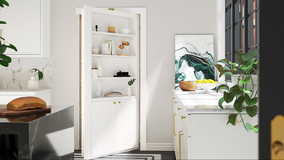 White InvisiDoor pivot bookcase door swung open in a white kitchen